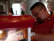 Volunteer working the pop corn station